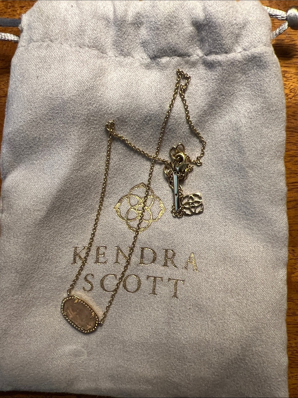 Kendra Scott Gold Necklace with Light Pink Oval Stone